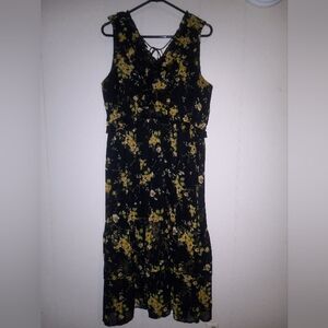 Ruffled sun dress. Size  X Large. Black with yellow flowers.